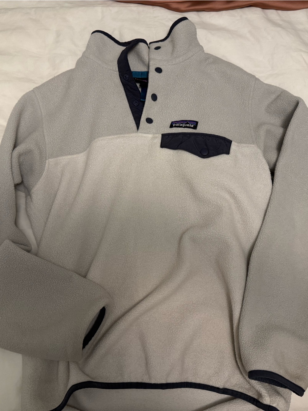 Patagonia women’s Light Gray Fleece Snap-Up with Black Trim